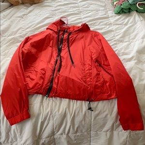 cropped red windbreaker